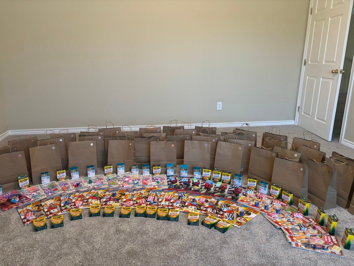 Screen-free and STEM kits being prepped for donation.